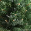 A close-up view of the branches and needles of an artificial Christmas tree. Produktbild-Vorschau
