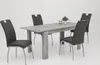 A dining table with four chairs against a white background. Produktbild-Vorschau