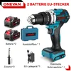 A collection of items for a cordless drill, including the drill itself, batteries, a case, and a charger, arranged on a white background. Voir les images du produit