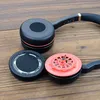 Disassembled headphones on a wooden surface. Náhľad obrázku produktu