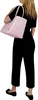 A woman is shown from the back, wearing a black outfit and carrying a pink tote bag over her shoulder. Produktbild-Vorschau