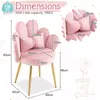 A pink velvet armchair with dimensions and load capacity indicated by text and lines. Náhľad obrázku produktu