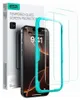 A product shot of an iPhone screen protector kit, including the packaging, a phone with a screen protector applied, and two additional screen protectors. Anteprima dell’immagine prodotto