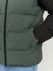 Close-up of a puffer jacket with a hand in the pocket. Produktbild-Vorschau
