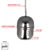 A stainless steel tea infuser hanging by a chain, with labels pointing to its features and dimensions. Produktbild-Vorschau