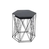 A modern black hexagonal side table with a geometric wireframe base, presented on a white background. Produktbild-Vorschau