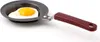 A single fried egg in a mini heart-shaped frying pan. Náhľad obrázku produktu