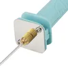 A close-up view of the tip of a handheld electric foam cutter, showing the metal needle and the brass collet. Náhľad obrázku produktu