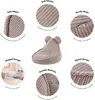 A collage of images showcasing a beige corduroy bean bag chair for children, with close-ups highlighting its features and a lifestyle shot of it in a room. Anteprima dell’immagine prodotto