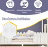 A children's bed with a fence-like headboard and a cloud-shaped pillow on the mattress. The image also features marketing text and icons at the top. Náhled obrázku produktu