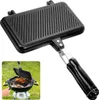 A sandwich grill with a black handle and a silver connection to the grill plate. The grill plate has a ribbed surface. A smaller inset image shows the grill being used on a barbecue. Produktbild-Vorschau