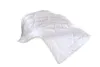 A white quilted comforter is shown floating against a white background. Náhled obrázku produktu