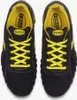 A top-down view of a pair of black and yellow Diadora work shoes. Náhľad obrázku produktu