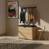 A hallway scene with a shoe cabinet, coat rack, and artwork. Náhľad obrázku produktu