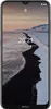 A smartphone displaying the lock screen with a landscape wallpaper. Náhled obrázku produktu