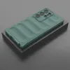 A green phone case with a textured back is shown on a dark gray surface. Produktbild-Vorschau