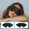 A woman wearing a black sleep mask. Anteprima dell’immagine prodotto