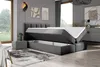 A modern bedroom with a large storage bed, nightstand, and abstract art on the wall. Produktbild-Vorschau