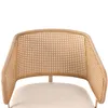 Close-up of the back of a chair with a rattan weave. Voir les images du produit