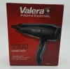 A black Valera professional hair dryer is shown on its red packaging box. Náhľad obrázku produktu