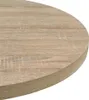 A close-up view of the edge and surface of a round table with a wood grain texture. Náhled obrázku produktu