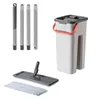 A flat mop, bucket, and handle pieces are arranged on a white background. Anteprima dell’immagine prodotto
