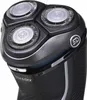 Close-up view of the head of a black electric shaver with three rotating shaving heads. Produktbild-Vorschau