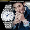 A man wearing a watch and smoking. Produktbild-Vorschau