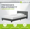 A bed with promotional text and icons. Náhled obrázku produktu