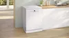 A white freestanding dishwasher is shown in a modern kitchen setting. Produktbild-Vorschau