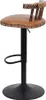 A bar stool with a brown leather seat and backrest, and a black metal base and stem. Podgląd zdjęcia produktu