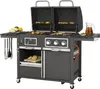 A dark gray Tepro Kohle-Gas-Kombigrill "Toronto Kombi" is shown against a white background. The grill has two lids, both open, revealing food on the grates. There are side shelves with food and a pitcher of liquid. The grill has control knobs and storage c Produktbild-Vorschau