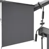A close-up view of a gray retractable awning screen and its mounting hardware. Náhled obrázku produktu