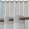 Close-up view of white outdoor curtains with grommets on a curtain rod, with water splashing on the left side. Produktbild-Vorschau