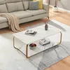 A modern living room scene featuring a couch and a marble-look coffee table. Náhled obrázku produktu