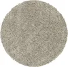 A round, shaggy rug with a high pile.