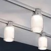 A close-up shot of three track lights mounted on a ceiling track. Produktbild-Vorschau