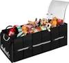 A black car trunk organizer filled with groceries and other items, with a reflective interior lid open. Náhled obrázku produktu