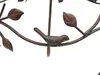 A close-up of a decorative metal bird on a branch, part of a plant stand. Produktbild-Vorschau