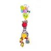 A hanging baby toy in the shape of a zebra with a colorful musical box attachment. Podgląd zdjęcia produktu