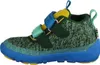 A side view of a child's shoe. Voir les images du produit