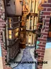 A miniature model of Diagon Alley from Harry Potter, with detailed buildings and a cobblestone path. Produktbild-Vorschau