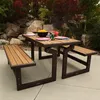 A picnic table set up outdoors with food and drinks on it. Podgląd zdjęcia produktu