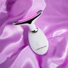 A white facial toning device with a silver and pink glowing tip rests on a draped purple satin fabric. Náhľad obrázku produktu