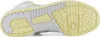 The underside of a white and yellow Adidas sneaker. Produktbild-Vorschau