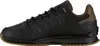 Side view of a black and brown athletic shoe. Podgląd zdjęcia produktu