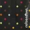 A close-up view of a black fabric with colorful polka dots and the brand name 'reisenthel' printed vertically on the right side. Podgląd zdjęcia produktu