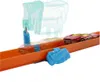A Hot Wheels track with two cars, one red and one orange, racing on it. There is a translucent blue "ice" effect over the orange car, suggesting a feature of the track. Náhled obrázku produktu