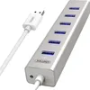 A silver USB hub with a white USB cable is shown against a white background. Voir les images du produit
