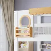 Close-up of a bunk bed with a small shelf and a round mirror. Podgląd zdjęcia produktu